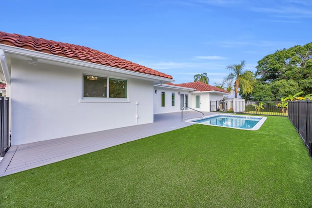 4372 SW Bimini Cir N, Palm City, FL 34990 - back of house featuring a tile roof, a patio area, and stucco siding