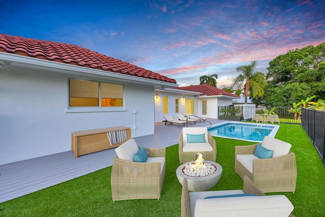 4372 SW Bimini Cir N, Palm City, FL 34990 - view of pool with a deck and an outdoor fire pit