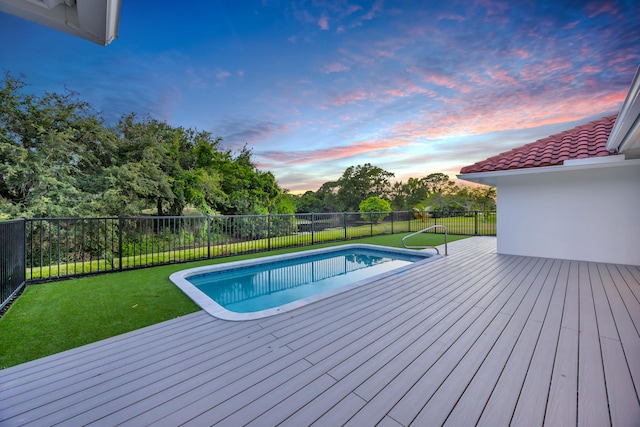 4372 SW Bimini Cir N, Palm City, FL 34990 - pool at dusk featuring a deck
