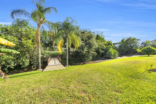 4372 SW Bimini Cir N, Palm City, FL 34990 - view of grassy yard