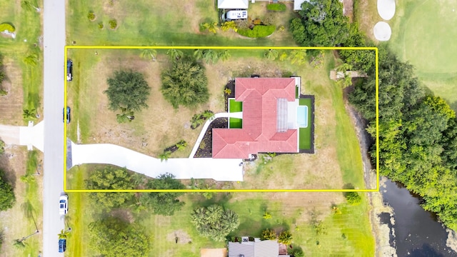 4372 SW Bimini Cir N, Palm City, FL 34990 - aerial view of property and surrounding area with a nearby body of water and property boundaries highlighted