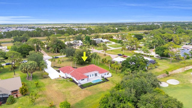 4372 SW Bimini Cir N, Palm City, FL 34990 - aerial perspective of suburban area featuring a tree filled landscape and a golf course