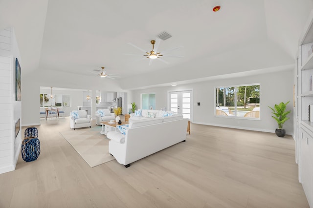 4372 SW Bimini Cir N, Palm City, FL 34990 - living room featuring light wood-type flooring, a ceiling fan, and baseboards