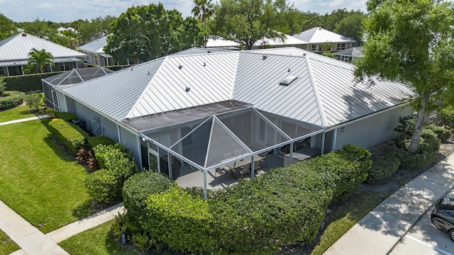 view of home's exterior with a yard