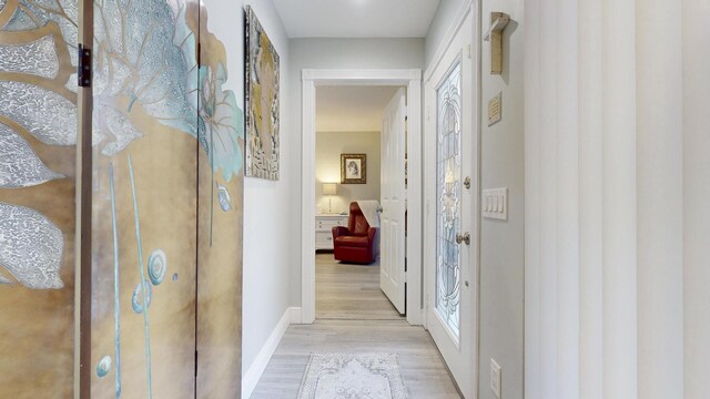 bedroom with visible vents, light wood-style flooring, ceiling fan, and access to exterior