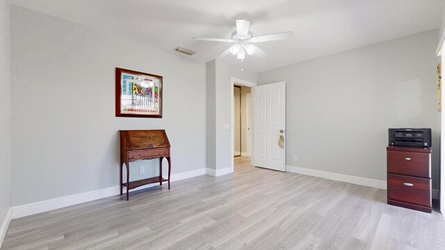full bath with vanity, bath / shower combo with glass door, wood finished floors, and toilet
