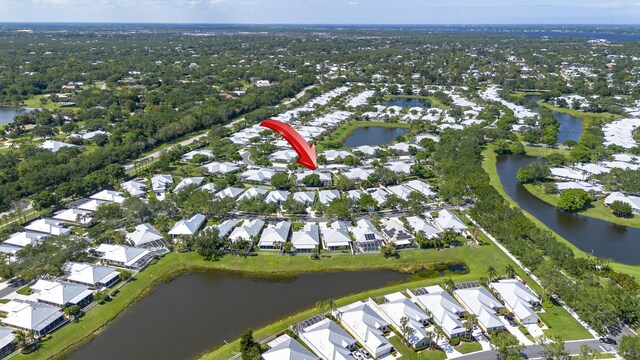 aerial view with a water view and a residential view