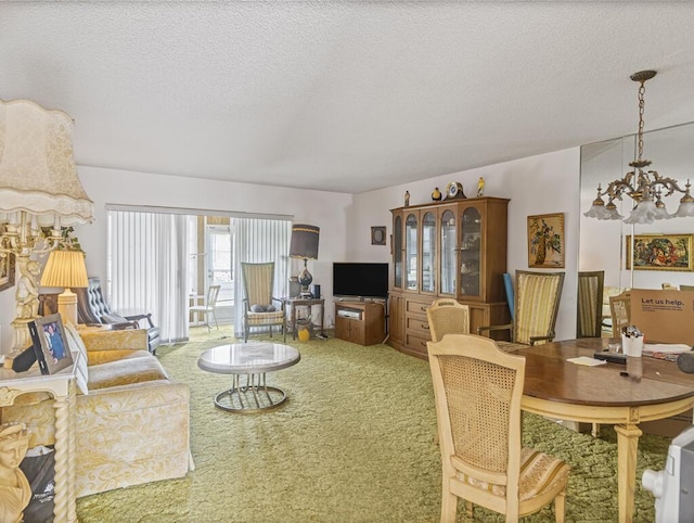 103 Oxford 500 Unit 103, West Palm Beach, FL 33417 - carpeted living room with a chandelier and a textured ceiling