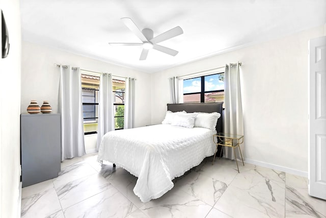 4670 Laurel Tree Rd Unit A, Boynton Beach, FL 33436 - bedroom featuring marble finish floor, baseboards, and ceiling fan