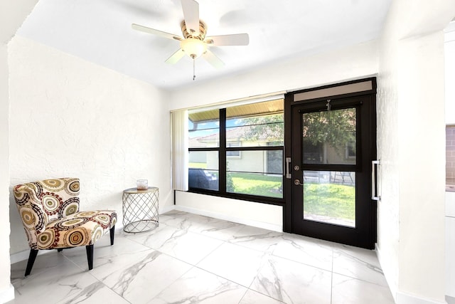 4670 Laurel Tree Rd Unit A, Boynton Beach, FL 33436 - sitting room with ceiling fan, baseboards, and marble finish floor