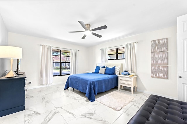 4670 Laurel Tree Rd Unit A, Boynton Beach, FL 33436 - bedroom featuring baseboards, marble finish floor, and ceiling fan