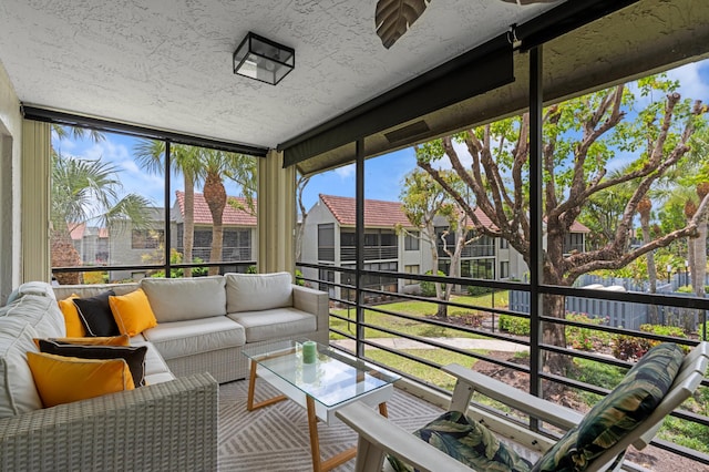 sunroom with an outdoor hangout area