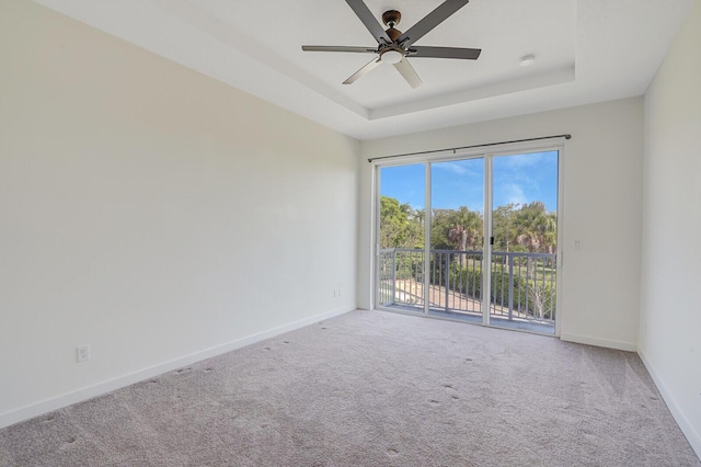 340 Pioneer Way, Royal Palm Beach, FL 33411 - carpeted spare room featuring a ceiling fan, baseboards, and a raised ceiling