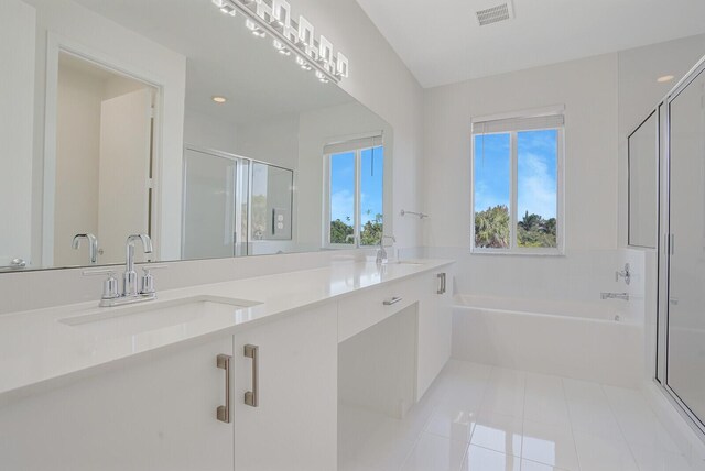 340 Pioneer Way, Royal Palm Beach, FL 33411 - bathroom with tile patterned floors, visible vents, a shower stall, and a sink