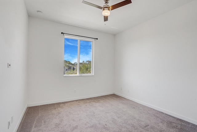 340 Pioneer Way, Royal Palm Beach, FL 33411 - unfurnished room featuring ceiling fan, baseboards, and carpet