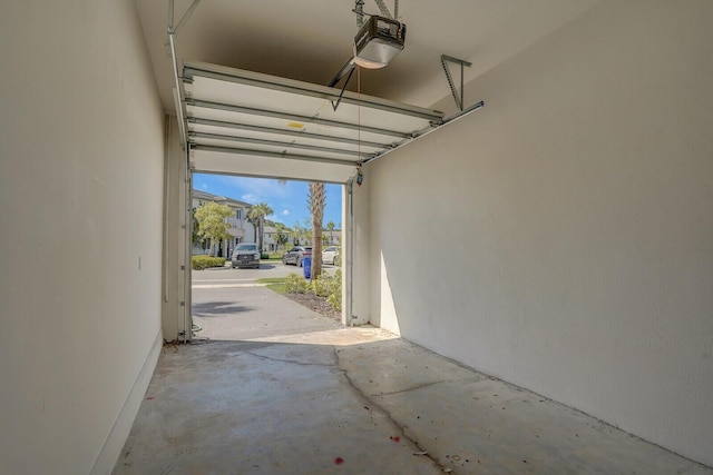 340 Pioneer Way, Royal Palm Beach, FL 33411 - garage featuring a garage door opener
