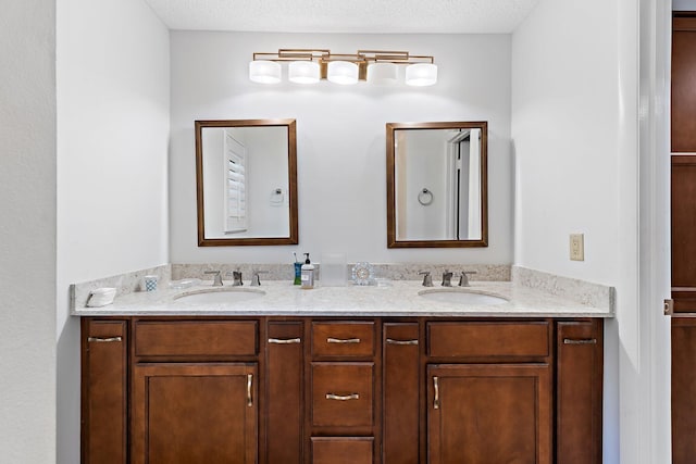bathroom with double vanity