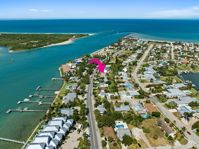 1625 Seaway Dr, Hutchinson Island, FL 34949 - aerial perspective of suburban area with a large body of water
