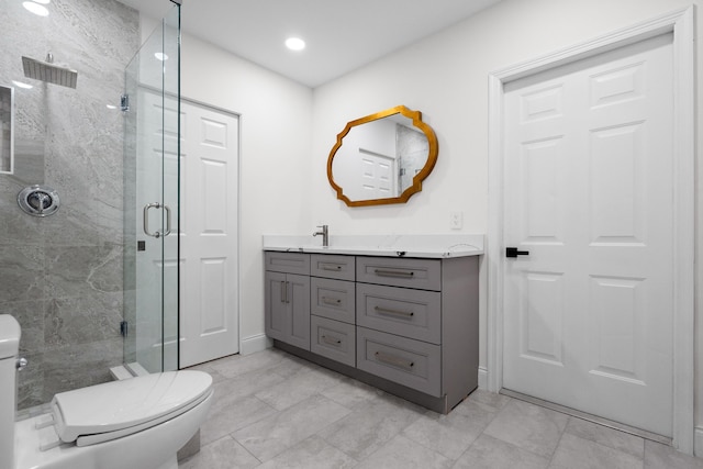 1625 Seaway Dr, Hutchinson Island, FL 34949 - full bathroom with toilet, a marble finish shower, vanity, and baseboards