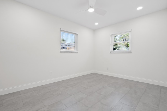 1625 Seaway Dr, Hutchinson Island, FL 34949 - unfurnished room featuring plenty of natural light, ceiling fan, baseboards, and recessed lighting