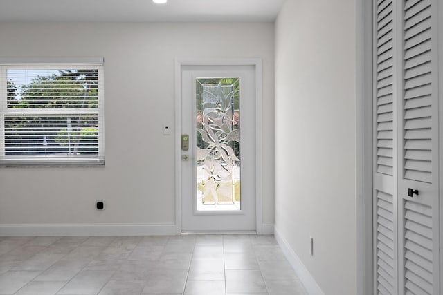 1625 Seaway Dr, Hutchinson Island, FL 34949 - foyer featuring baseboards