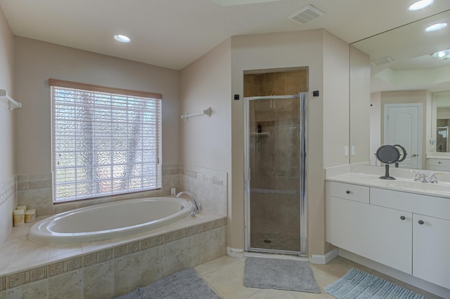 full bath featuring tile patterned flooring, visible vents, vanity, a bath, and a stall shower