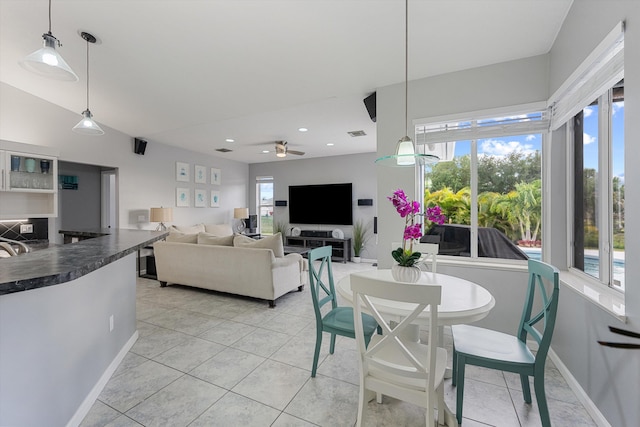 dining area with baseboards, recessed lighting, ceiling fan, and light tile patterned floors