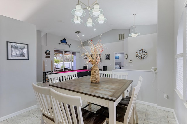 dining space featuring visible vents, a notable chandelier, lofted ceiling, and light tile patterned flooring