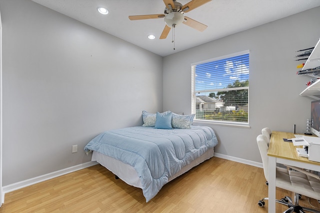 bedroom with recessed lighting, baseboards, a ceiling fan, and light wood-type flooring
