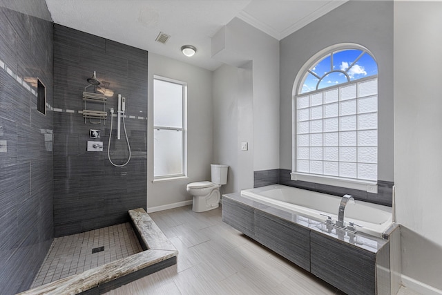 full bathroom with toilet, baseboards, a tile shower, and a bath