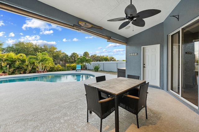 view of pool with a patio, fence, a ceiling fan, and a fenced in pool