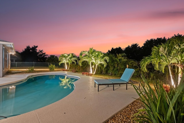 view of pool with a patio, a fenced in pool, and a fenced backyard
