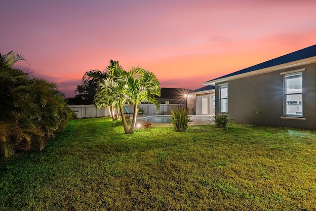 view of yard with a fenced in pool and a fenced backyard