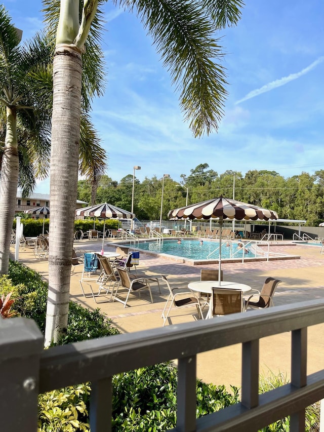 pool featuring a patio