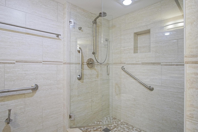 bathroom with a stall shower
