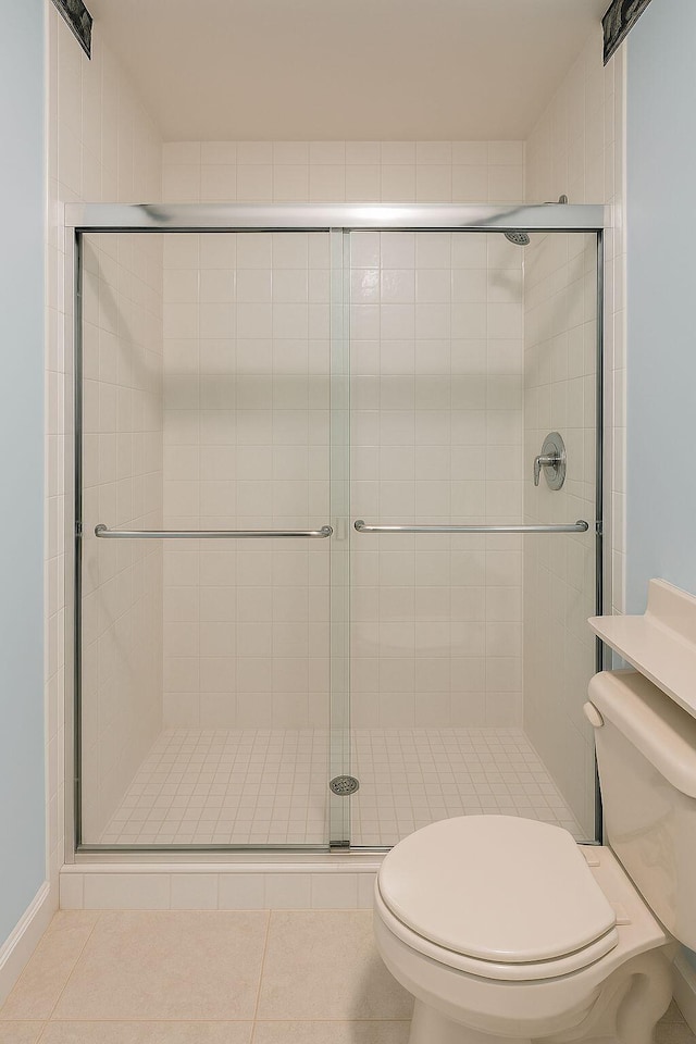12040 SW Elsinore Dr, Port Saint Lucie, FL 34987 - bathroom featuring toilet and a stall shower