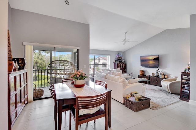 3399 Jog Park Dr, Greenacres, FL 33467 - dining area with ceiling fan, light tile patterned floors, and vaulted ceiling