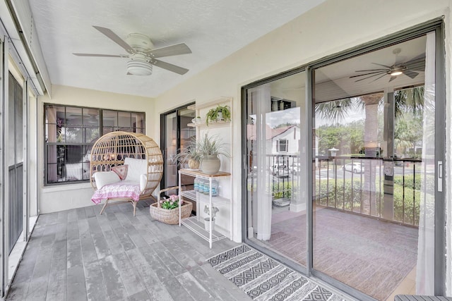 3399 Jog Park Dr, Greenacres, FL 33467 - sunroom / solarium with ceiling fan and wood finished floors
