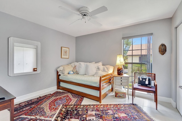 3399 Jog Park Dr, Greenacres, FL 33467 - bedroom featuring a ceiling fan and baseboards