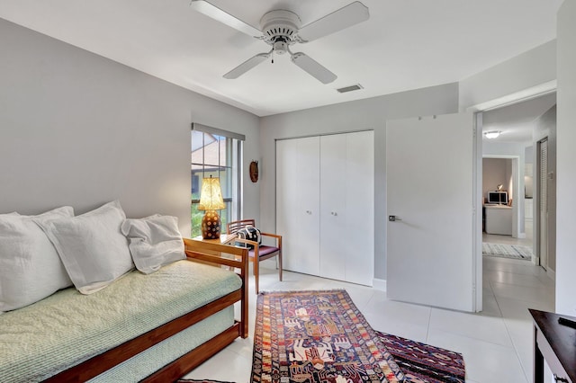 3399 Jog Park Dr, Greenacres, FL 33467 - bedroom featuring a closet, ceiling fan, light tile patterned floors, and visible vents