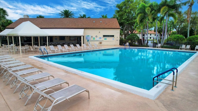 3399 Jog Park Dr, Greenacres, FL 33467 - pool featuring a patio area and fence