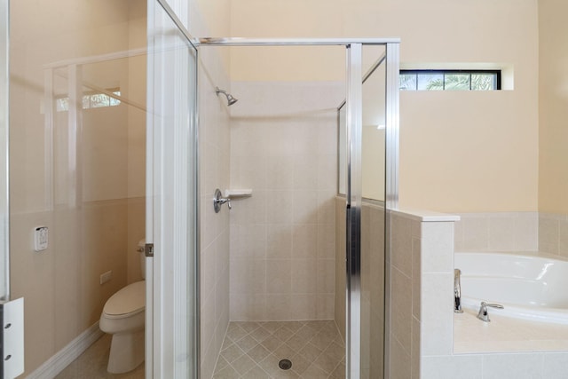 10765 Pisa Rd, Wellington, FL 33414 - full bathroom with toilet, a shower stall, and a garden tub