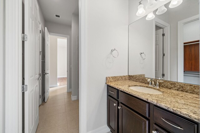 10765 Pisa Rd, Wellington, FL 33414 - walk in closet with wood finished floors