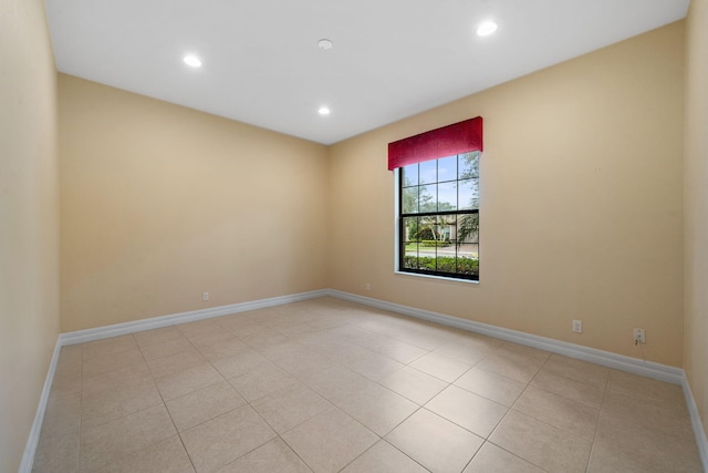 10765 Pisa Rd, Wellington, FL 33414 - empty room with baseboards, recessed lighting, and light tile patterned flooring