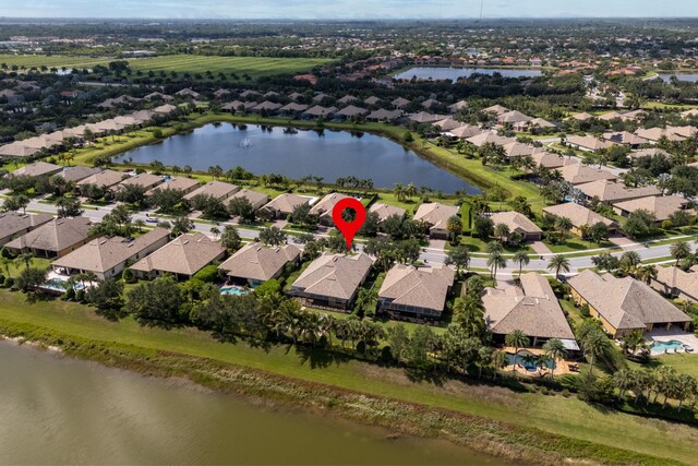 10765 Pisa Rd, Wellington, FL 33414 - mediterranean / spanish home with a tiled roof, stucco siding, and french doors