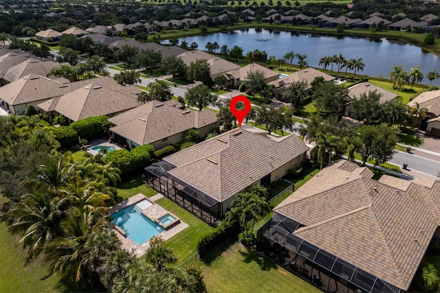 10765 Pisa Rd, Wellington, FL 33414 - drone / aerial view with a water view and a residential view