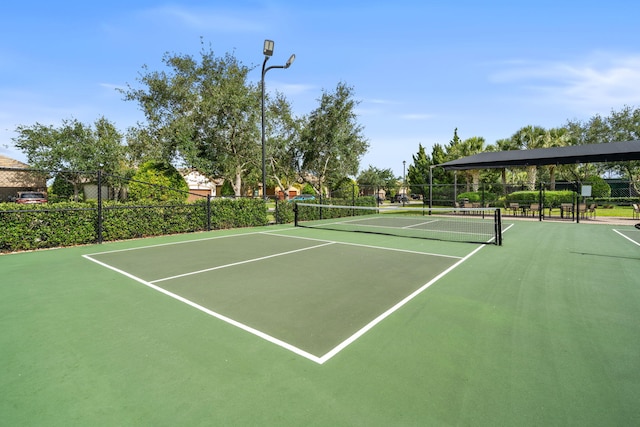 10765 Pisa Rd, Wellington, FL 33414 - view of sport court featuring fence and community basketball court