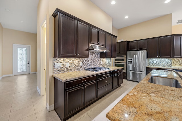 10765 Pisa Rd, Wellington, FL 33414 - kitchen featuring light tile patterned floors, under cabinet range hood, appliances with stainless steel finishes, and a sink