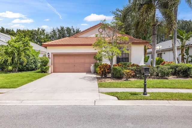10056 Lexington Cir N, Boynton Beach, FL 33436 - view of front of property featuring a front lawn, a tile roof, a garage, stucco siding, and driveway
