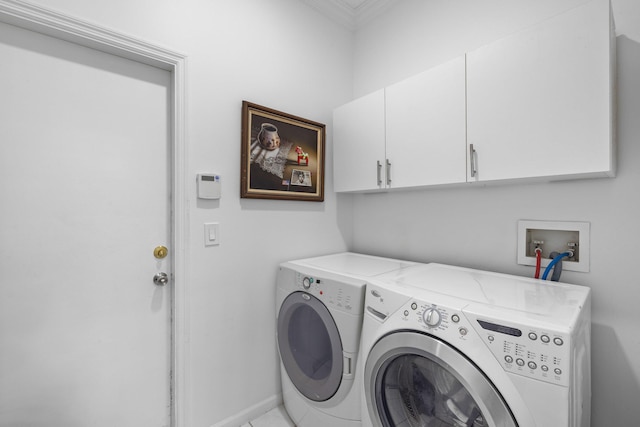 10056 Lexington Cir N, Boynton Beach, FL 33436 - washroom with cabinet space, ornamental molding, and washer and clothes dryer